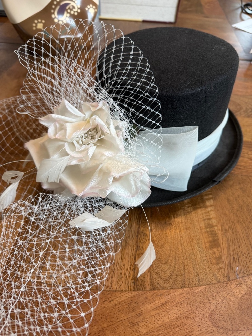 Black Felt Top Hat With White Toole Band, Silk Flowers, Feathers and Netting